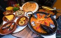 Spanish cuisine, tapas and seafood paella Royalty Free Stock Photo