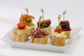 Spanish Cuisine. Tapas. Tray of montaditos. Royalty Free Stock Photo