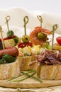 Spanish Cuisine. Tapas. Tray of montaditos. Royalty Free Stock Photo