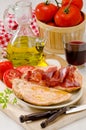 Spanish Cuisine. Tomato bread and Serrano Ham. Pa amb tomaquet i