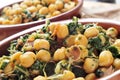 Spanish espinacas con garbanzos, spinach with chickpeas, served Royalty Free Stock Photo