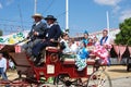 Spanish family in horse drawn carriage, Seville.