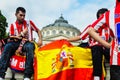 Spanish fans celebrating near Romanian Atheneum Royalty Free Stock Photo