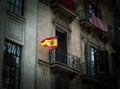 The Spanish flag proudly waves atop an ancient Spanish architectural marvel.