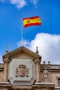 Spanish flag waving in the sky Royalty Free Stock Photo