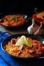 Spanish food specialty - chorizo sausage cooked with rice, tomatio, paprika,