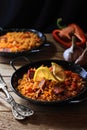 Spanish food specialty - chorizo sausage cooked with rice, tomatio, paprika,