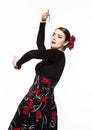 Spanish girl flamenco dancer on a light background Royalty Free Stock Photo