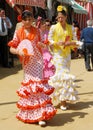 Spanish girls in flamenco dresses, Seville. Royalty Free Stock Photo
