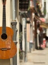 Spanish guitar on the wall Royalty Free Stock Photo