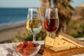 Spanish hard Andalusian cheese filled with sweet sherry served outdoor with membrillo jam with two glasses of sherry wine with Royalty Free Stock Photo