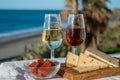 Spanish hard Andalusian cheese filled with sweet sherry served outdoor with membrillo jam with two glasses of sherry wine with Royalty Free Stock Photo