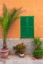 Spanish house with green shutters in beautiful Majorca island. Royalty Free Stock Photo