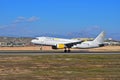 Vueling Passenger Plane About To Land Royalty Free Stock Photo