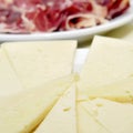 Spanish manchego cheese and serrano ham Royalty Free Stock Photo