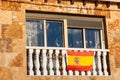 Spanish national flag on the balcony of a house. Palma, Majorca Royalty Free Stock Photo