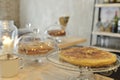 A Spanish omelette on a glass tray on the counter