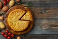 Spanish omelette with potatoes and onion, typical Spanish cuisine. Tortilla espanola. Rustic dark background. Top view Royalty Free Stock Photo