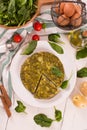 Spanish omelette with spinach. Royalty Free Stock Photo