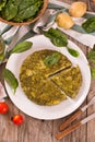 Spanish omelette with spinach. Royalty Free Stock Photo