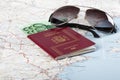 Spanish passports with european union currency and glasses on a Royalty Free Stock Photo