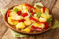 Spanish Patatas a lo Pobre Poor ManÃÂ´s Potatoes made of sliced potatoes are fried in olive oil with onion and pappers close up in Royalty Free Stock Photo