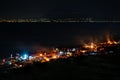 Spanish people celebrating the night of San Juan, the longest day of the year, on the beach with bonfires, Daimus, Spain