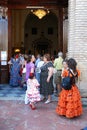 Spanish people entering a church, Marbella.