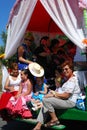 Spanish people sitting in a caravan.