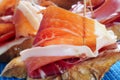 Spanish pinchos de jamon, serrano ham served on bread Royalty Free Stock Photo