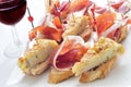 spanish pinchos, spanish tortilla and serrano ham served on bread Royalty Free Stock Photo