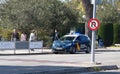 Spanish police wearing protective mask patrol to stop and warn the citizens to get back to their houses as a quarantine is set Royalty Free Stock Photo