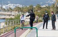 Spanish police wearing protective mask patrol to stop and warn the citizens to get back to their houses as a quarantine is set Royalty Free Stock Photo