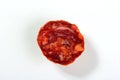 Spanish pork chorizo salami sausage slice texture isolated on white background Royalty Free Stock Photo