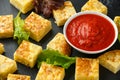 Spanish Potato Frittata tapas with tomato sauce on stone board Royalty Free Stock Photo