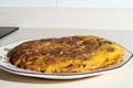 Spanish potato omelet mixed with ecological eggs Royalty Free Stock Photo