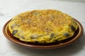 Spanish potato omelette with Japanese shitake mushrooms and onion. Traditional tapas recipe.