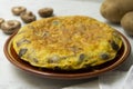 Spanish potato omelette with Japanese shitake mushrooms and onion. Traditional tapas recipe.