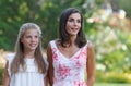 Spanish Queen Letizia and Princess Sofia pose in Marivent palace gardens Royalty Free Stock Photo