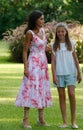 Spanish Queen Letizia and Princess Sofia pose in Marivent palace gardens vertical Royalty Free Stock Photo