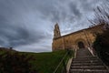 Spanish romanesque church in a stormy day with cloudy and dramatic sky , palencia, spain Royalty Free Stock Photo