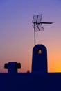 Spanish roof with antenna. Royalty Free Stock Photo