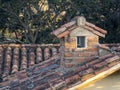 A Spanish roof tile covered ceiling of a house