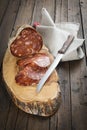 Spanish sausage called morcon on a cutting board