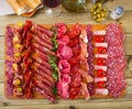 Spanish sausage cutting Royalty Free Stock Photo