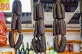 Spanish sausages black chorizo hanging on butchers shop on farmers market