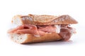 Spanish serrano ham sandwich isolated on white background. Royalty Free Stock Photo