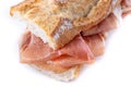 Spanish serrano ham sandwich isolated on white background. Spanish bocadillo de jamon serrano Royalty Free Stock Photo