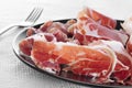 Spanish serrano ham served as tapas Royalty Free Stock Photo