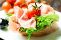 Spanish serrano ham tapas on bread Royalty Free Stock Photo